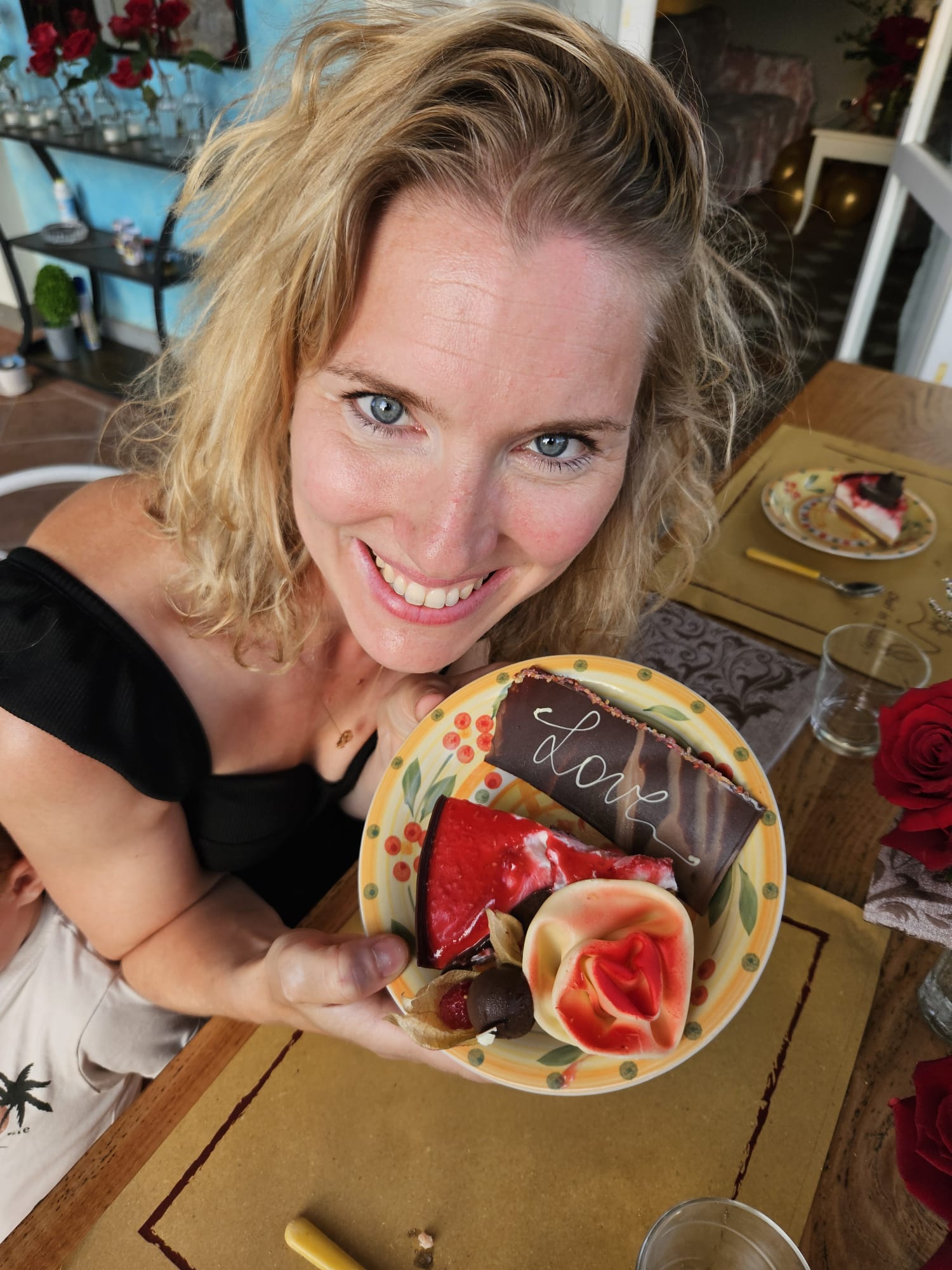 Guest presenting a plated dessert after a Tuscan cooking lesson