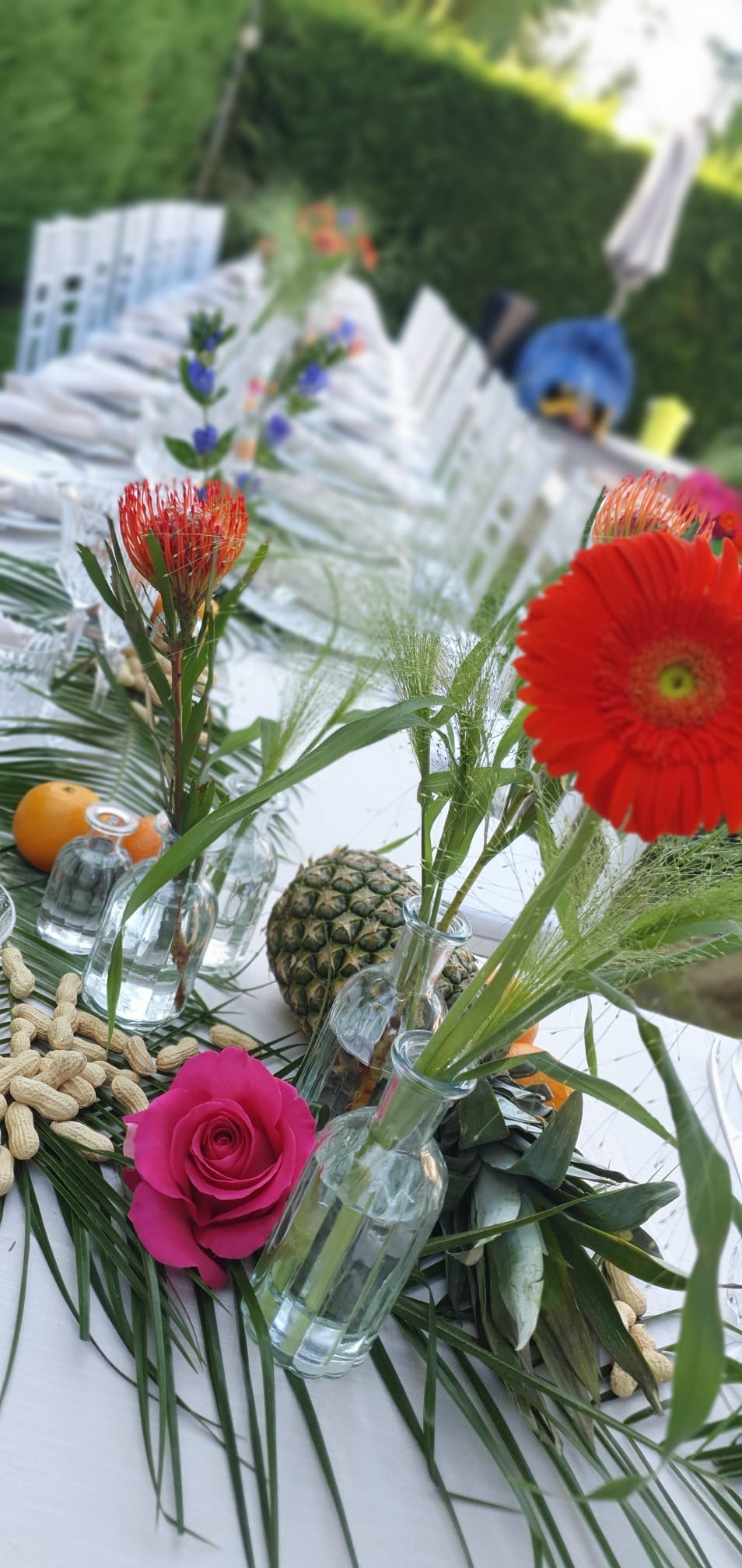 Vertical event detail with floral styling and bespoke table setting