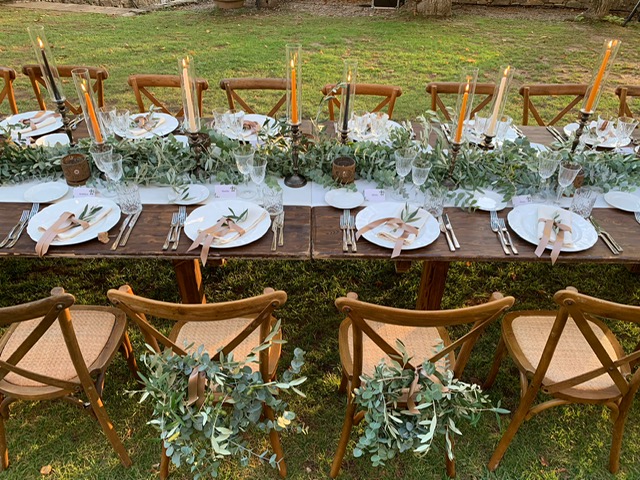 Reception setup beside the pool for an evening gathering in Tuscany