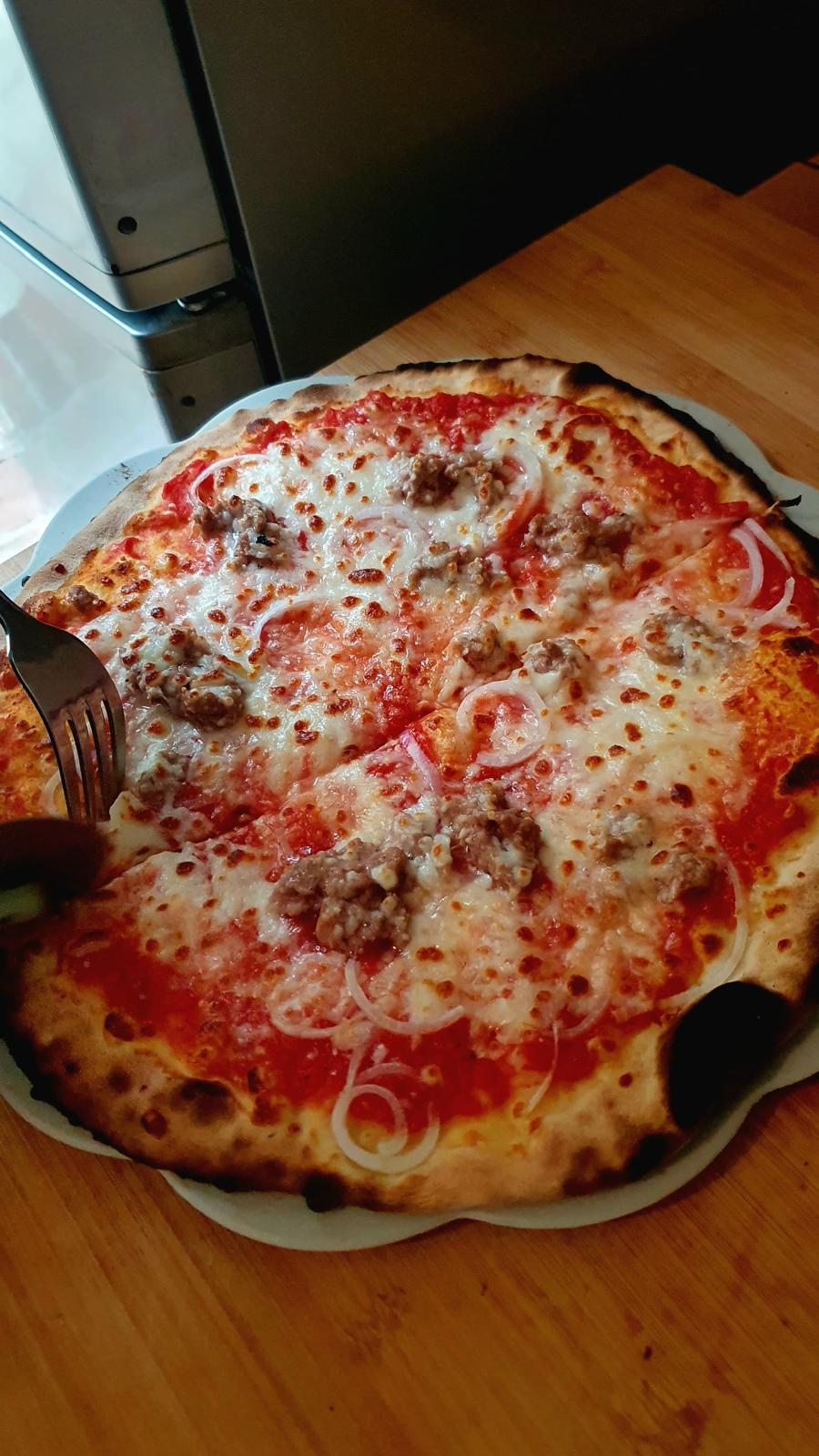 Classic pizza freshly baked during a Chef in Tuscany pizza lesson